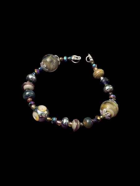 Handmade glass bead necklace and bracelet set in blues, greens and metallic glass, crystals and sterling silver bead caps.