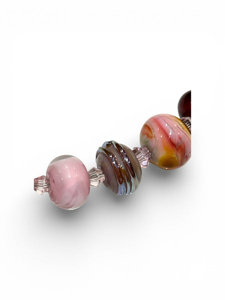 Handmade bead necklace of pink beads with Swarovski crystals and sterling silver