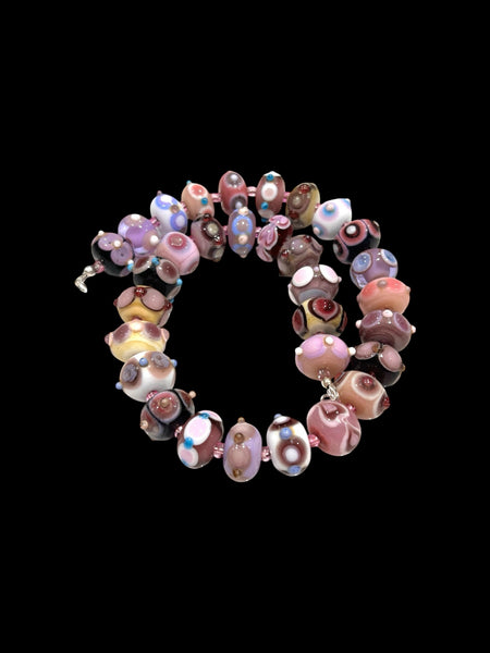 Handmade glass mini fantasy beads in mauves, pinks and purples