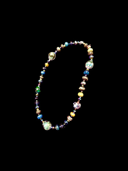 Handmade glass bead necklace and bracelet set in blues, greens and metallic glass, crystals and sterling silver bead caps.