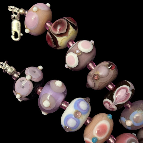 Handmade glass mini fantasy beads in mauves, pinks and purples