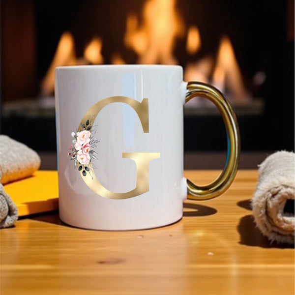 Gold Initial Mug with pink floral design and metallic gold handle